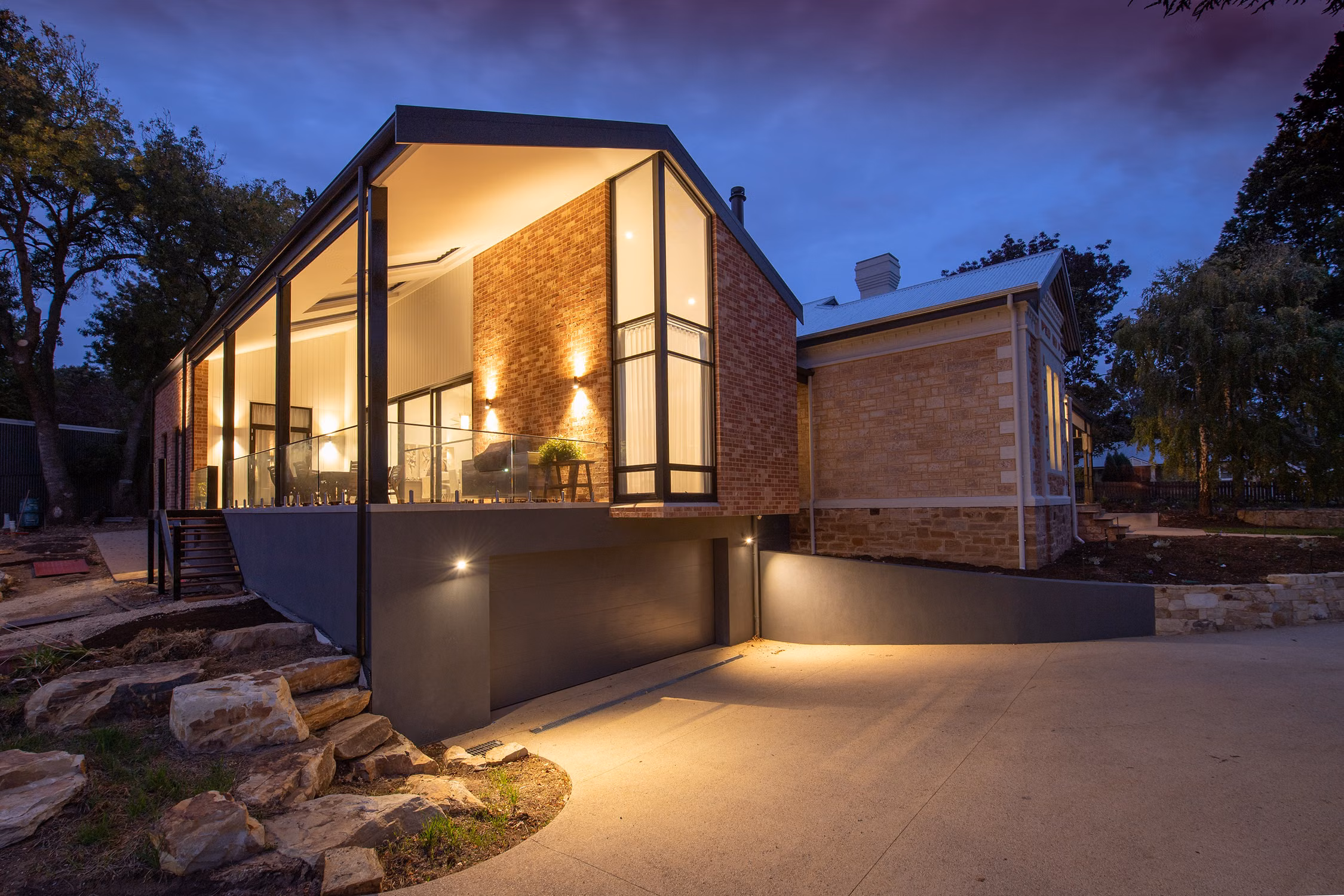 Illustrative stock photograph of a house exterior at dusk